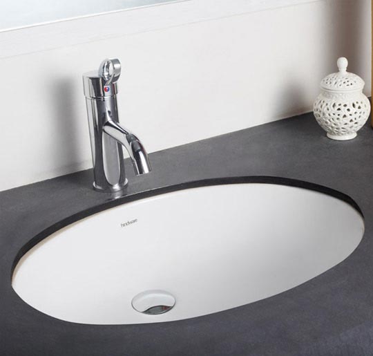 Compact design for small bathrooms. <br />Available in Starwhite 